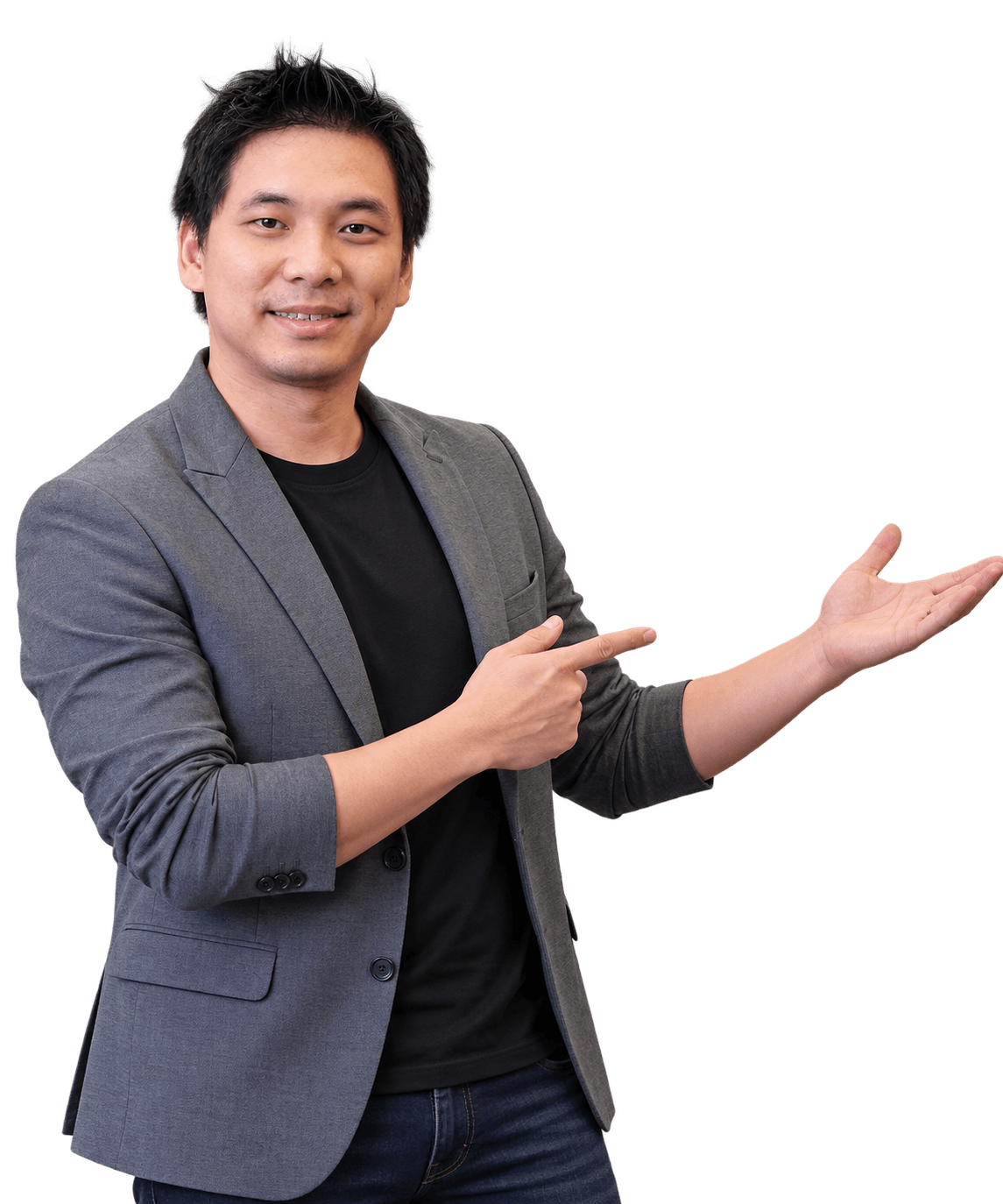 Husanto mengenakan blazer abu-abu, menunjuk ke arah cerita perjalanannya